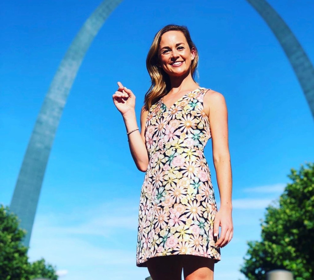 Emma Hogg, who currently reports for the KMOV in St. Louis, posing with the city's famous archs
