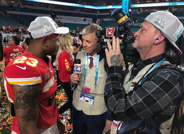 Journalist and Chief's fan John Holt interviewing Armani Watts during the Miami Super Bowl LIV coverage during the post-game coverage